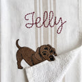 Example dachshund embroidery named Jelly on the beige stripe towel