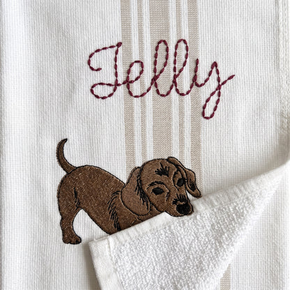 Example dachshund embroidery named Jelly on the beige stripe towel